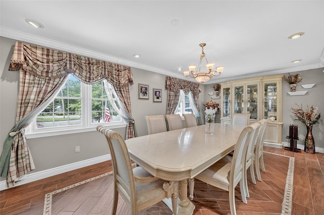 28 Lapin Ln, Blauvelt, NY 10913 - dining area featuring a chandelier, crown molding, recessed lighting, and inlaid floor details