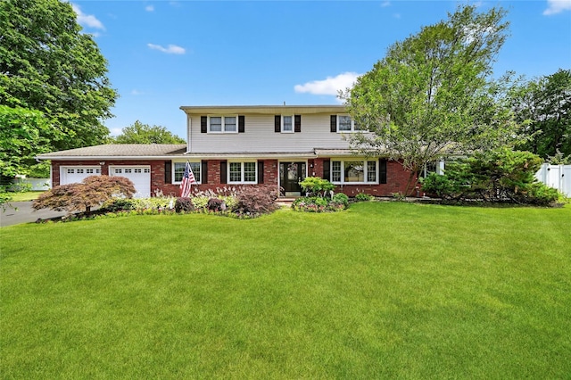 28 Lapin Ln, Blauvelt, NY 10913 - traditional home featuring an attached garage, brick siding, and driveway