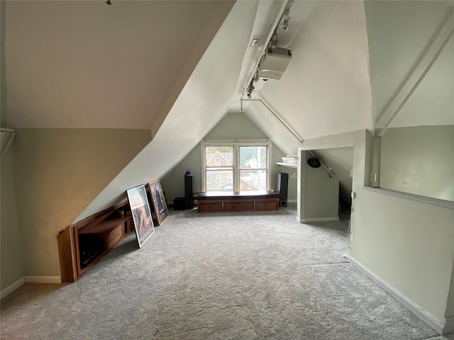 15 Grant St, Yonkers, NY 10704 - additional living space with carpet flooring and vaulted ceiling