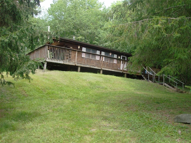 1460 Old Rte 17, Roscoe, NY 12776 - back of property featuring a yard, a wooden deck, and stairway