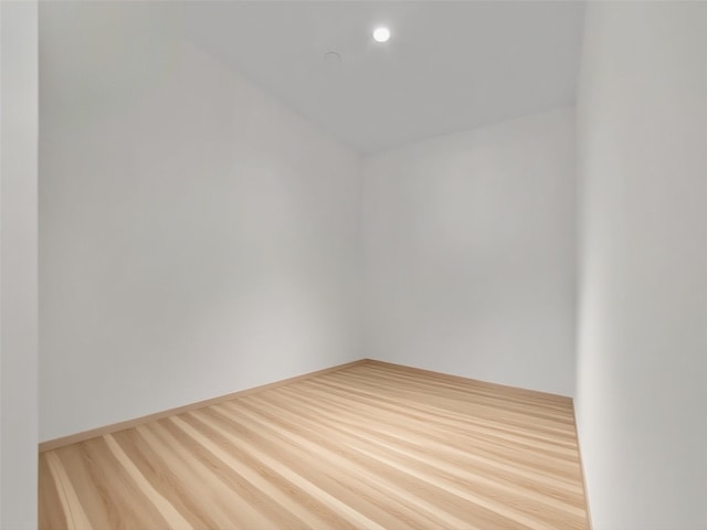 133-36 37th Ave Unit 10, Flushing, NY 11354 - empty room featuring wood finished floors and baseboards