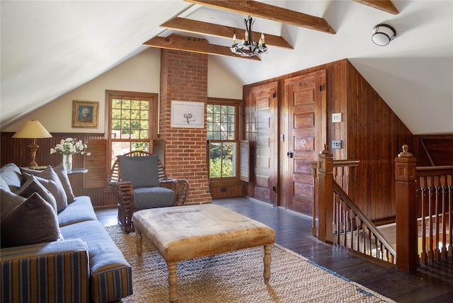 12120 New Suffolk Ave, Cutchogue, NY 11935 - living room with wood finished floors, a chandelier, and wooden walls