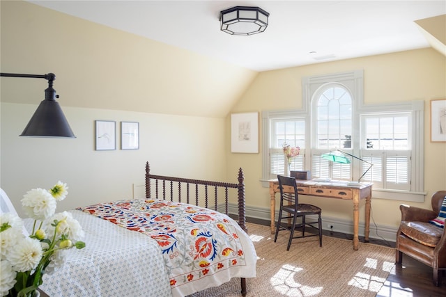 12120 New Suffolk Ave, Cutchogue, NY 11935 - bedroom featuring vaulted ceiling and wood finished floors