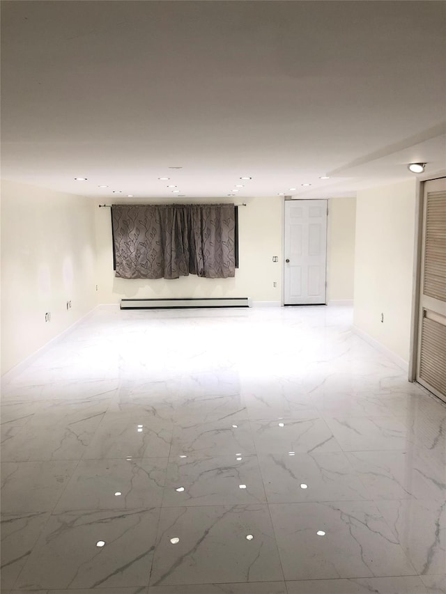148-03 Horace Harding Expy, Flushing, NY 11367 - spare room featuring light marble finish floors and a baseboard radiator