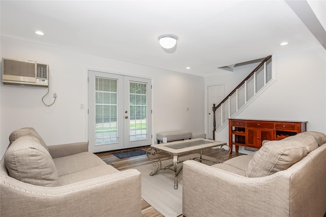406 Red Maple Dr W, Wantagh, NY 11793 - living area with a wall mounted air conditioner, french doors, wood finished floors, stairway, and recessed lighting