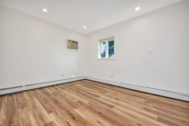 406 Red Maple Dr W, Wantagh, NY 11793 - empty room featuring light wood-style floors, a wall unit AC, and recessed lighting