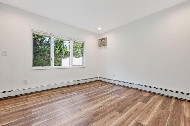406 Red Maple Dr W, Wantagh, NY 11793 - empty room with a wall mounted AC, light wood-style flooring, and recessed lighting