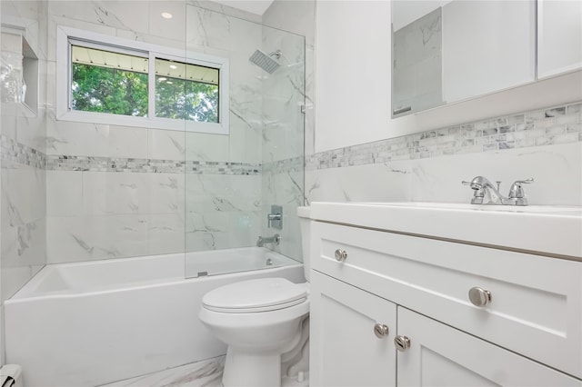 406 Red Maple Dr W, Wantagh, NY 11793 - bathroom featuring vanity, tub / shower combination, tile walls, marble finish flooring, and a baseboard radiator