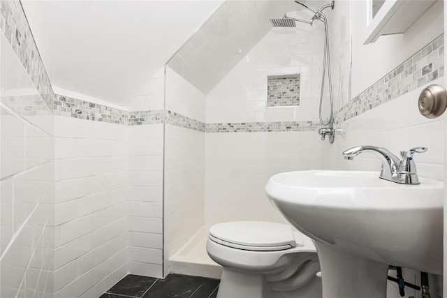 406 Red Maple Dr W, Wantagh, NY 11793 - full bath featuring tile walls, a tile shower, lofted ceiling, and tile patterned floors