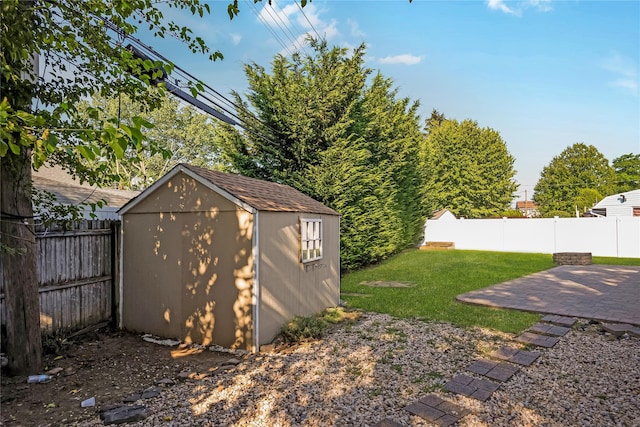 406 Red Maple Dr W, Wantagh, NY 11793 - fenced backyard with a storage shed and a patio area