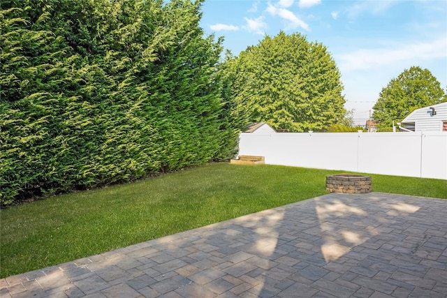 406 Red Maple Dr W, Wantagh, NY 11793 - fenced backyard featuring a patio area