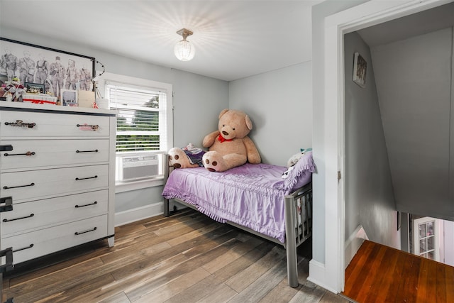 110 Pine Ave, Ossining, NY 10562 - bedroom featuring wood finished floors and cooling unit