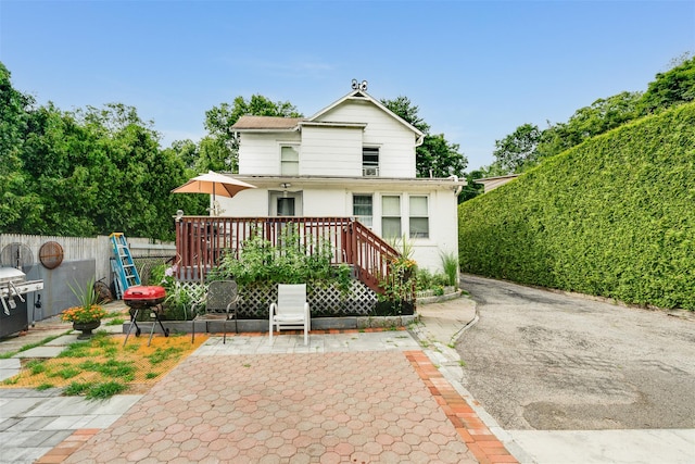 110 Pine Ave, Ossining, NY 10562 - view of front facade with a patio and a wooden deck