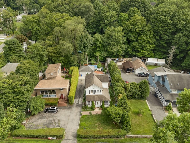 110 Pine Ave, Ossining, NY 10562 - aerial perspective of suburban area with a heavily wooded area
