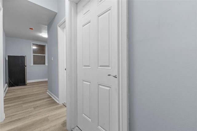 123 Elm St, Yonkers, NY 10701 - hallway with light wood-type flooring and baseboards