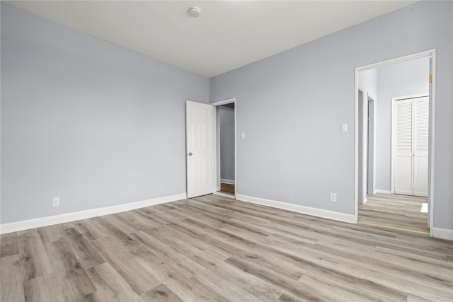 123 Elm St, Yonkers, NY 10701 - unfurnished room featuring light wood-style floors and a smoke detector