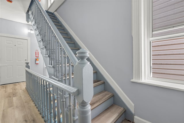 123 Elm St, Yonkers, NY 10701 - staircase featuring wood finished floors