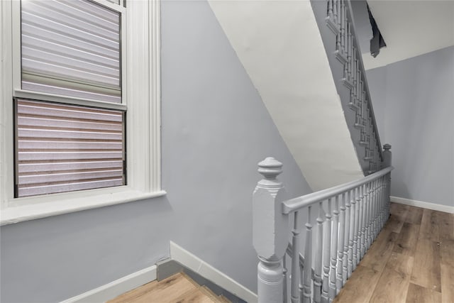 123 Elm St, Yonkers, NY 10701 - stairs with wood finished floors and baseboards
