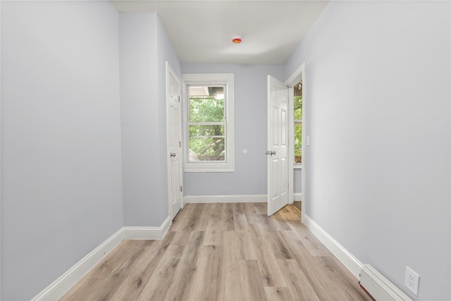 123 Elm St, Yonkers, NY 10701 - doorway featuring light wood-type flooring and baseboards