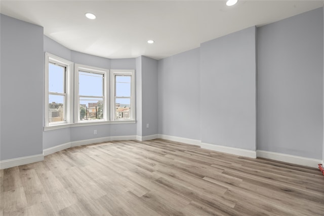 123 Elm St, Yonkers, NY 10701 - spare room with recessed lighting and light wood finished floors