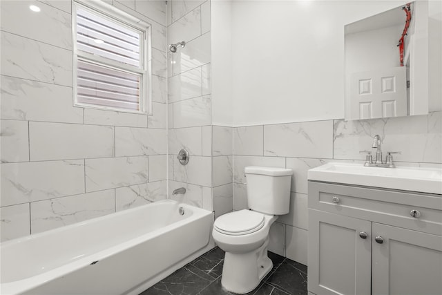 123 Elm St, Yonkers, NY 10701 - bathroom featuring vanity, shower / bath combination, marble look tiles, and tile walls