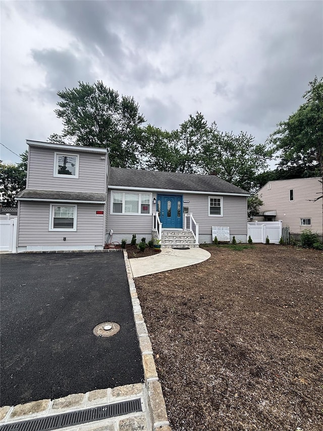 868 Oliver Ave, Westbury, NY 11590 - view of front of property with asphalt driveway