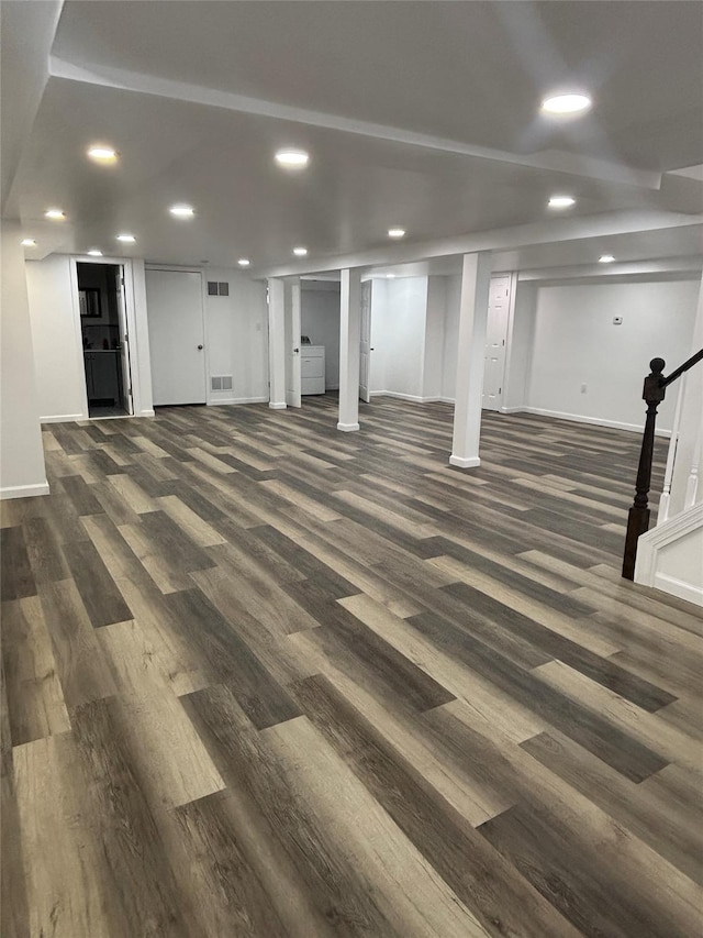 868 Oliver Ave, Westbury, NY 11590 - finished below grade area with dark wood-style flooring, recessed lighting, and stairs