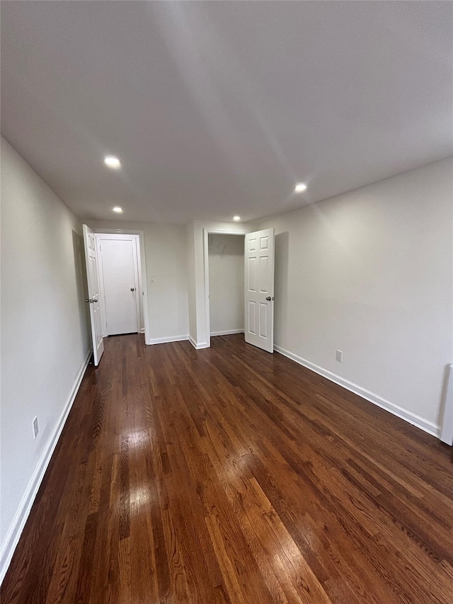 868 Oliver Ave, Westbury, NY 11590 - basement with dark wood-style flooring and recessed lighting