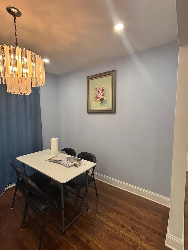 868 Oliver Ave, Westbury, NY 11590 - dining space featuring a chandelier, dark wood-type flooring, and recessed lighting
