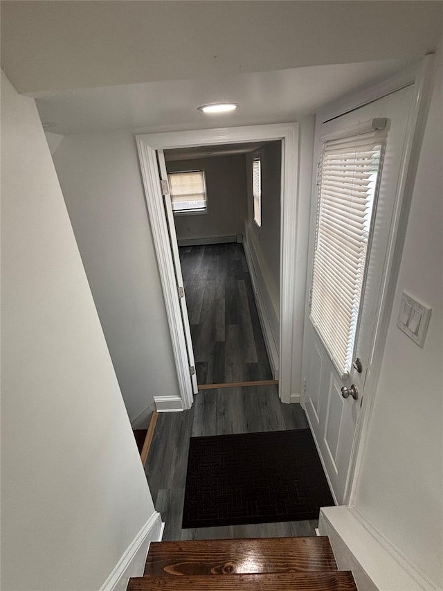 868 Oliver Ave, Westbury, NY 11590 - hallway with wood finished floors and baseboards