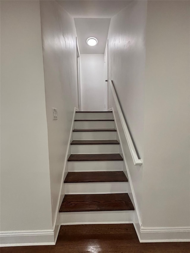 868 Oliver Ave, Westbury, NY 11590 - staircase with baseboards and wood finished floors