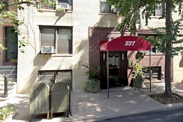 337 E 50th St Unit 3-A, New York Manhattan, NY 10022 - view of building exterior featuring cooling unit