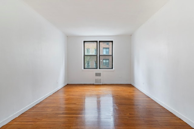 337 E 50th St Unit 3-A, New York Manhattan, NY 10022 - unfurnished room with radiator and wood finished floors