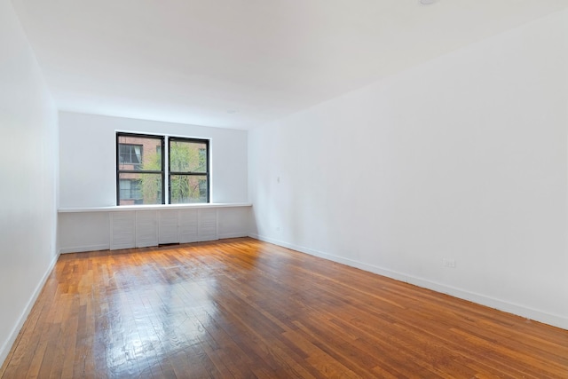 337 E 50th St Unit 3-A, New York Manhattan, NY 10022 - spare room featuring wood-type flooring