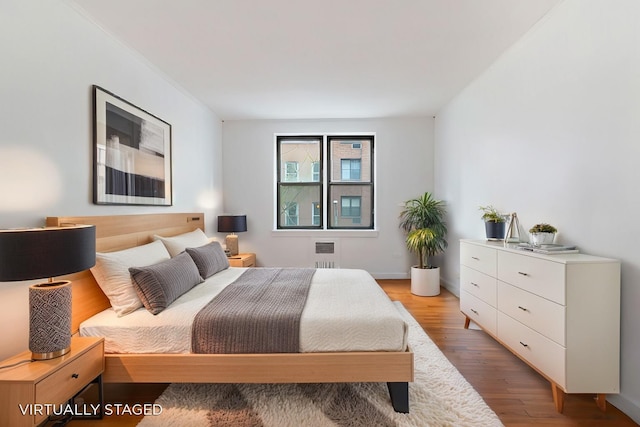 337 E 50th St Unit 3-A, New York Manhattan, NY 10022 - bedroom featuring light wood-style floors