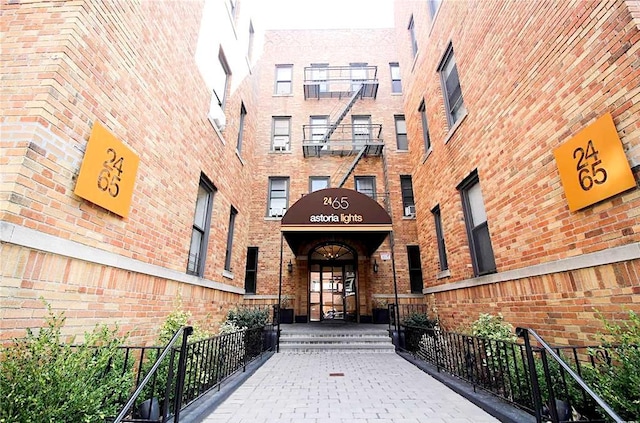 24-65 38th St Unit D10, Astoria, NY 11103 - property entrance featuring brick siding