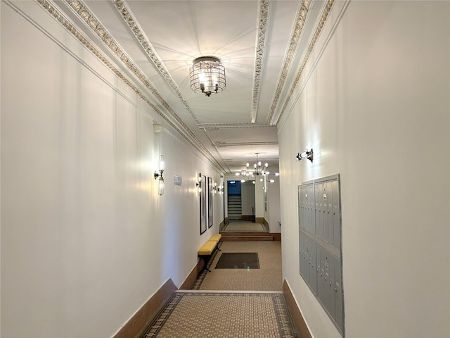 24-65 38th St Unit D10, Astoria, NY 11103 - hallway with mail area and a chandelier