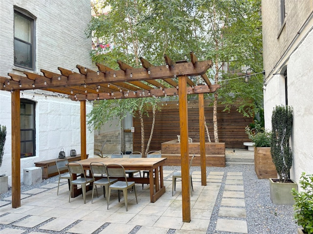 24-65 38th St Unit D10, Astoria, NY 11103 - view of patio / terrace featuring outdoor dining space and a pergola