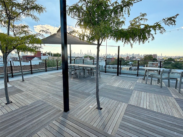 24-65 38th St Unit D10, Astoria, NY 11103 - wooden terrace with outdoor dining area