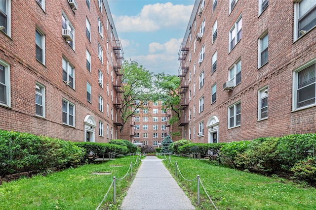 144-45 Sanford Ave Unit 6B, Flushing, NY 11355 - view of community with a yard