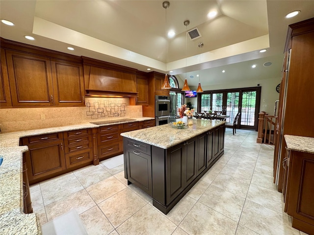 10 Hazelwood Ct, Jericho, NY 11753 - kitchen featuring black electric stovetop, recessed lighting, tasteful backsplash, stainless steel double oven, and light stone counters