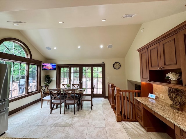 10 Hazelwood Ct, Jericho, NY 11753 - dining space with lofted ceiling and recessed lighting