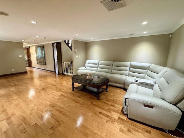 10 Hazelwood Ct, Jericho, NY 11753 - living area featuring crown molding, recessed lighting, and light wood-type flooring