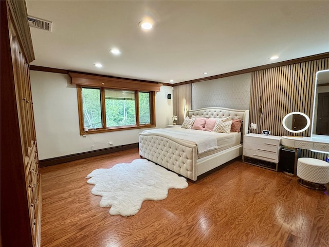 10 Hazelwood Ct, Jericho, NY 11753 - bedroom with crown molding, wood finished floors, and recessed lighting