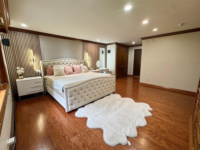 10 Hazelwood Ct, Jericho, NY 11753 - bedroom featuring crown molding, dark wood-type flooring, and recessed lighting