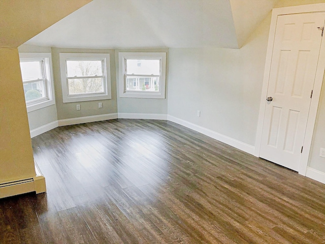 114 Park Ave, Mount Vernon, NY 10550 - empty room with vaulted ceiling, dark wood-style flooring, and healthy amount of natural light