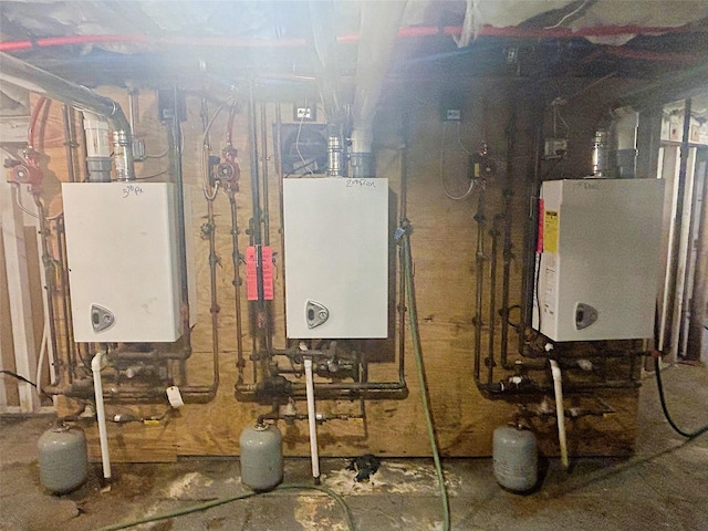 114 Park Ave, Mount Vernon, NY 10550 - utility room with water heater and tankless water heater