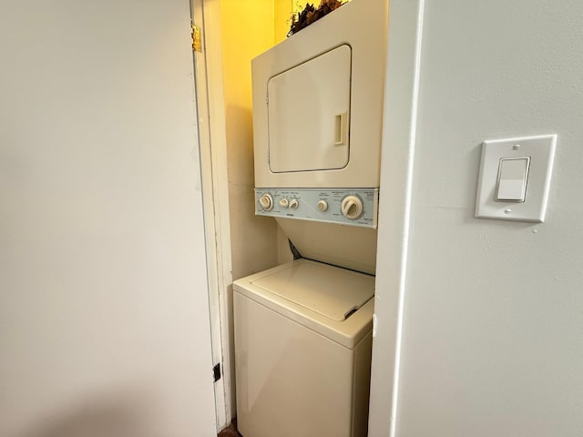 22035 67th Ave Unit C, Bayside, NY 11364 - washroom featuring stacked washing machine and dryer