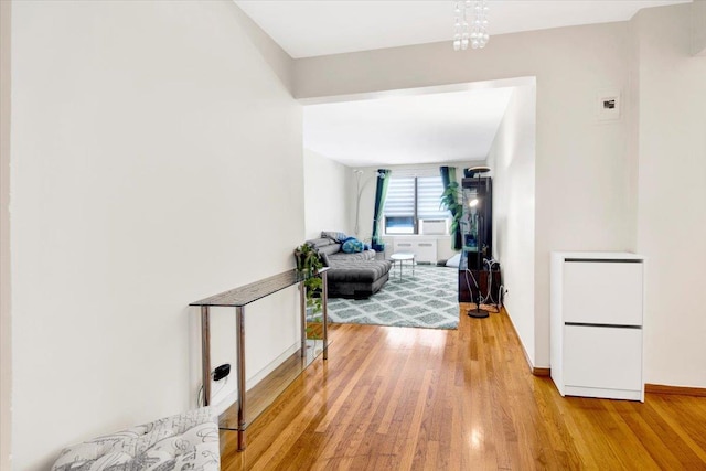 2615 Homecrest Ave Unit 1D, Brooklyn, NY 11235 - corridor with light wood-style floors and a chandelier