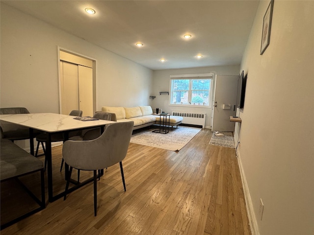 7827 Cloverdale Blvd Unit A, Oakland Gardens, NY 11364 - dining room featuring radiator, hardwood / wood-style floors, and recessed lighting